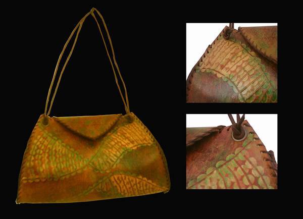 cartera_cuero_grueso_con_apliques.jpg